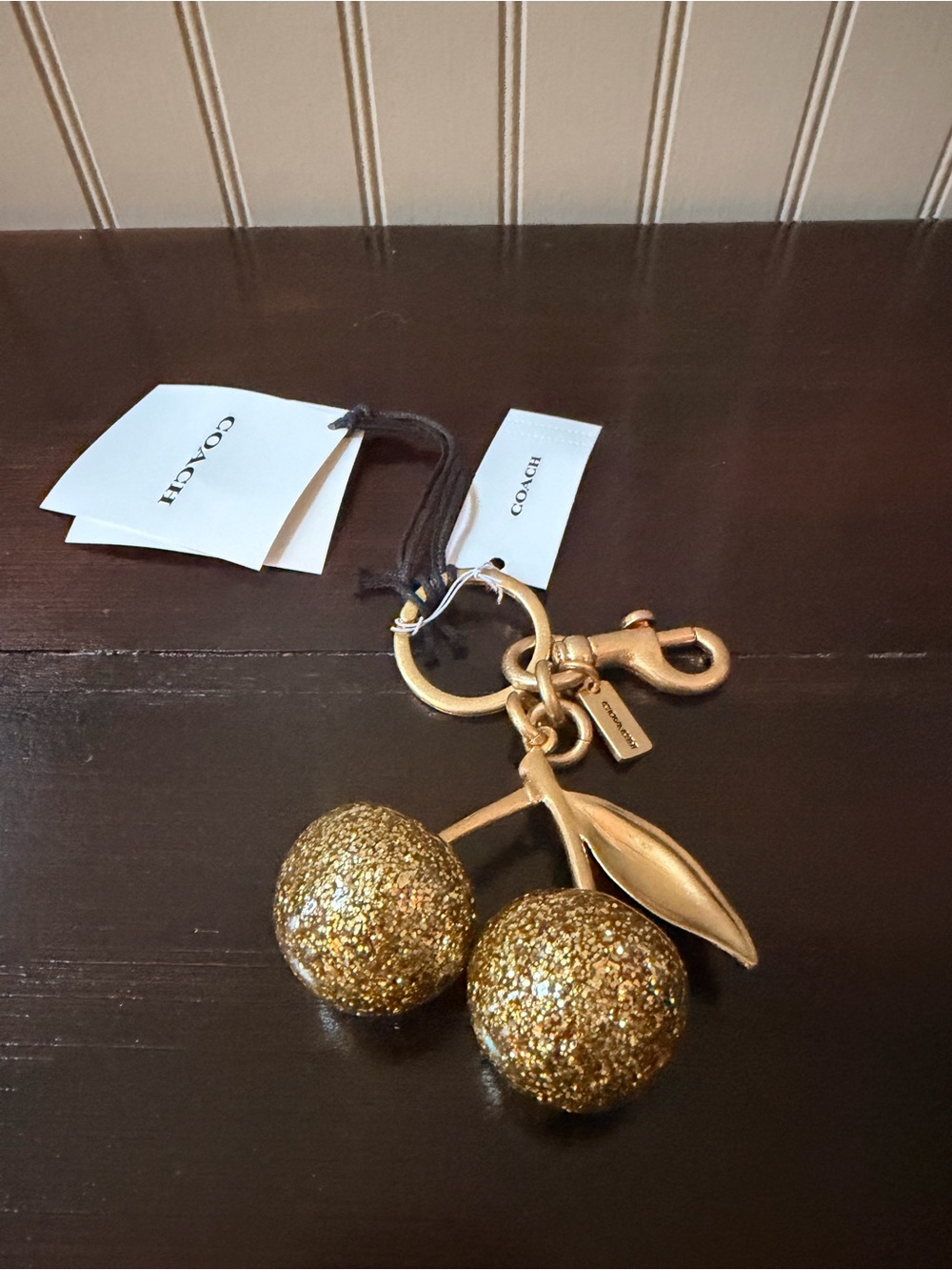 COACH Gold Glitter Cherry Bag Charm